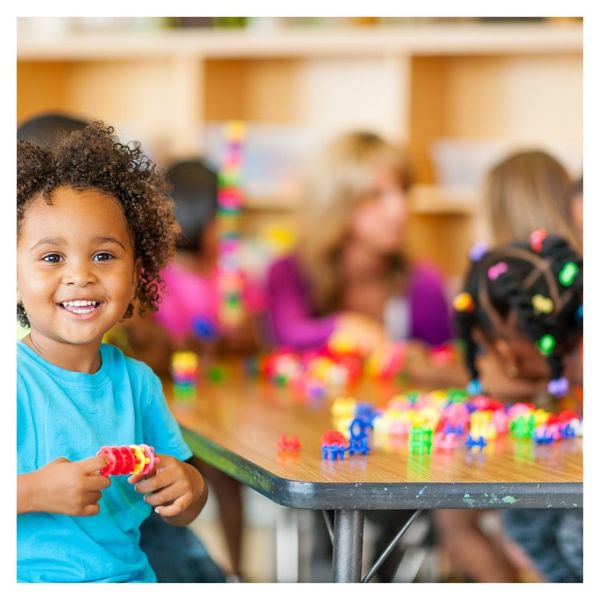 little boy playing at preschool