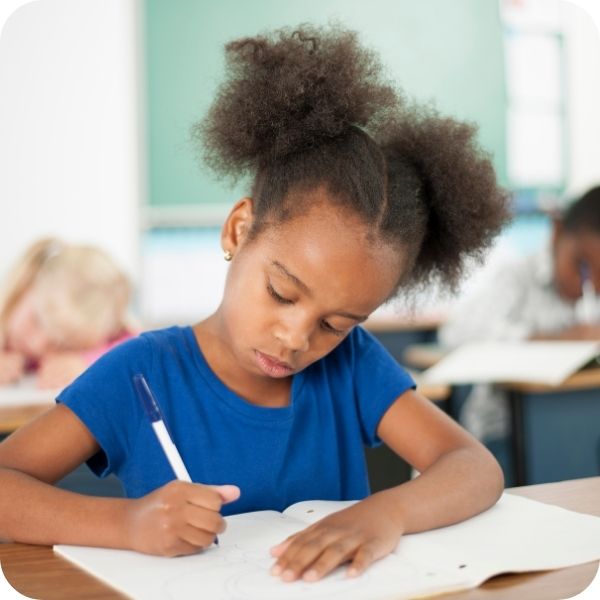 Young girl at her desk