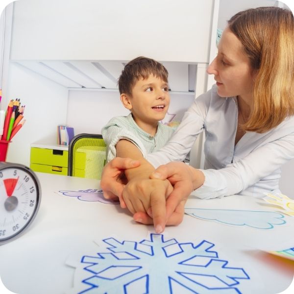 Boy drawing a snowflake