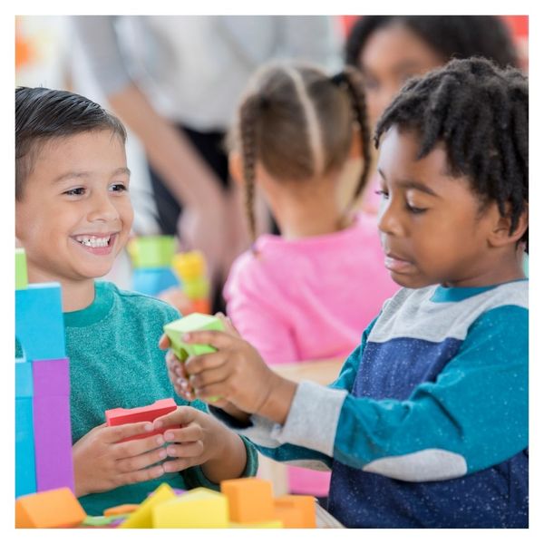 preschool boys playing with blocks