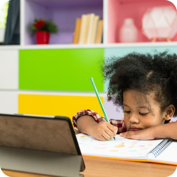 little girl working on homework