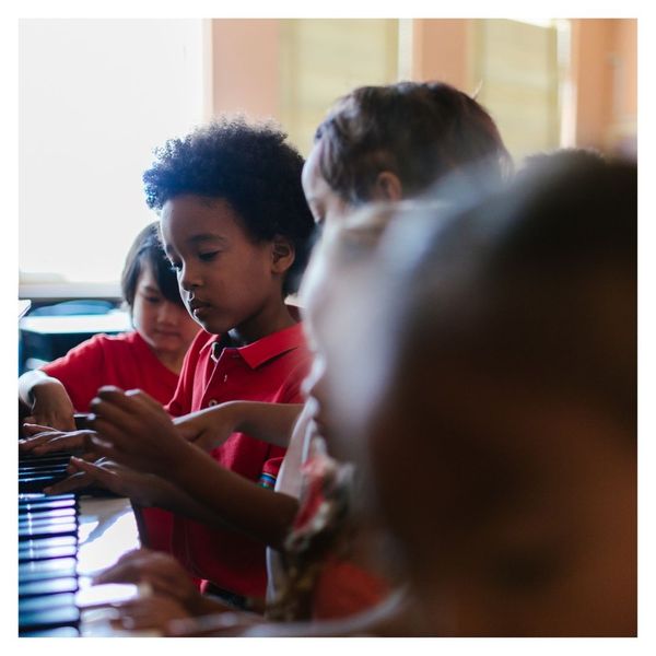 kids playing piano