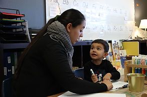 teacher with little boy