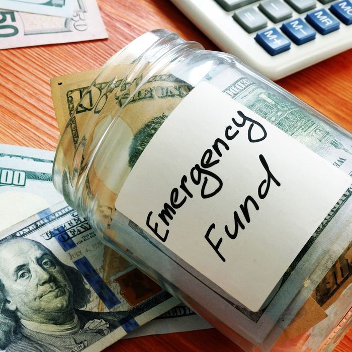 jar of cash labeled emergency fund