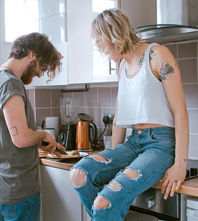 image of a happy couple in the kitchen image of a happy couple in the kitchen