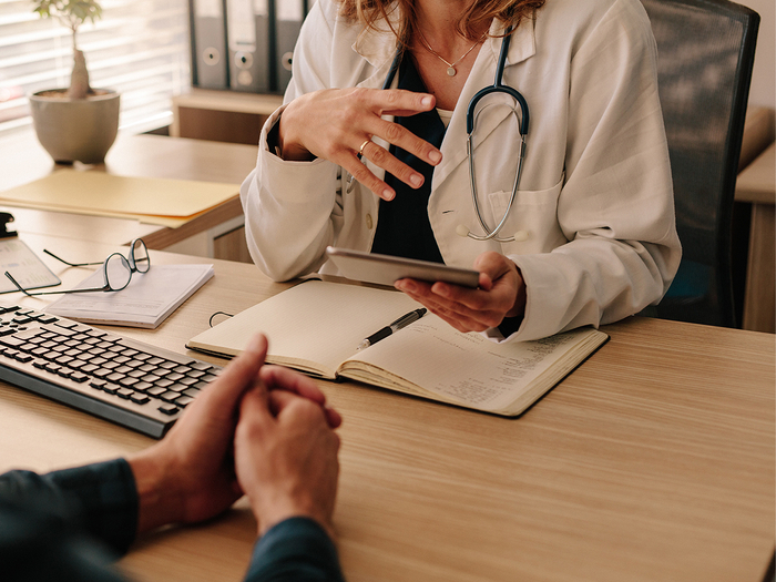 Doctor consulting with a patient in an office