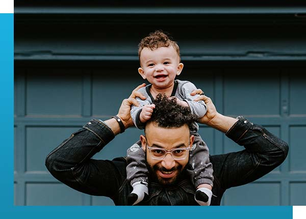Father with baby on shoulders Father with baby on shoulders