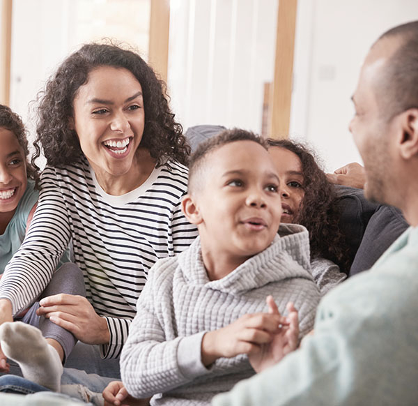 image of happy family in a living room