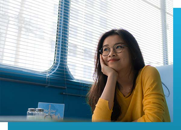 Woman smiling in diner