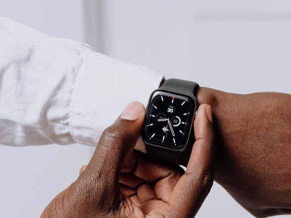 man looking at his watch