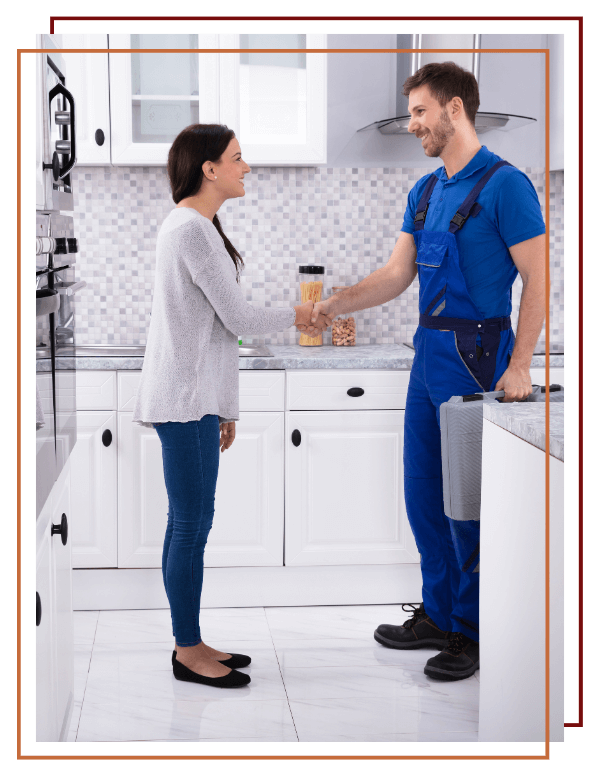 plumber shaking hands with client