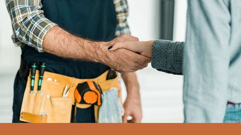 plumber shaking hands with customer