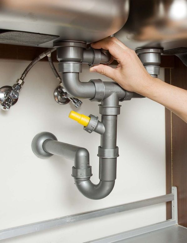 plumbing under the sink