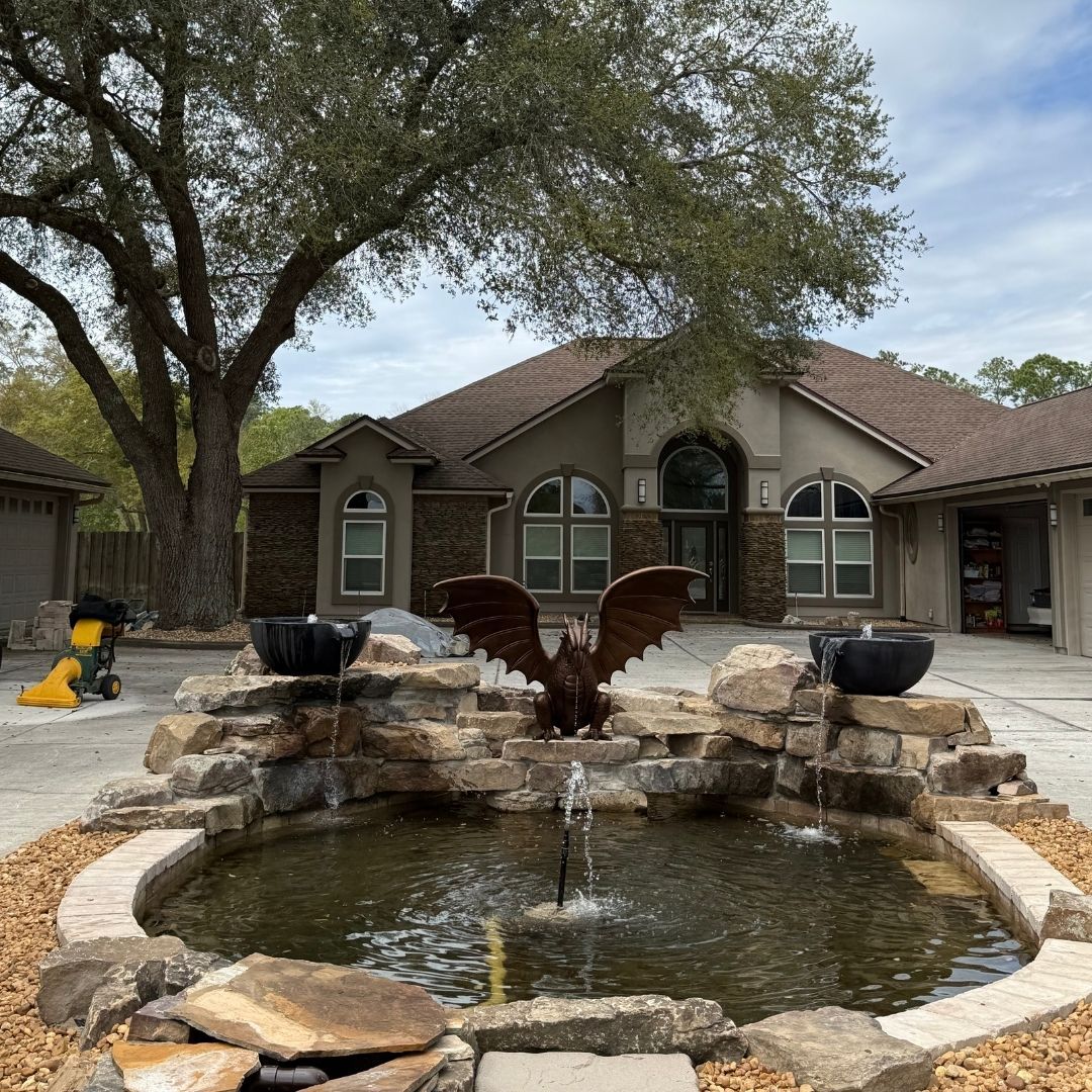 a water feature with a dragon