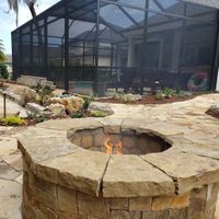 a fire burning in a fire pit