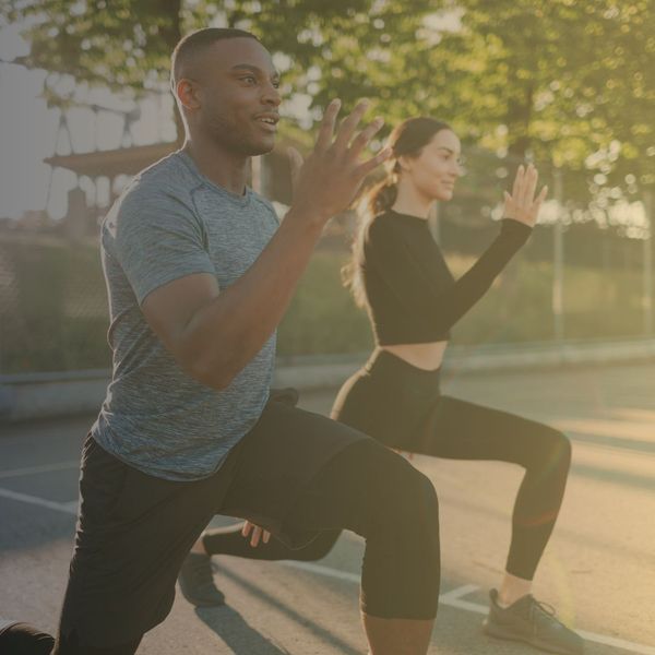 man and woman working out