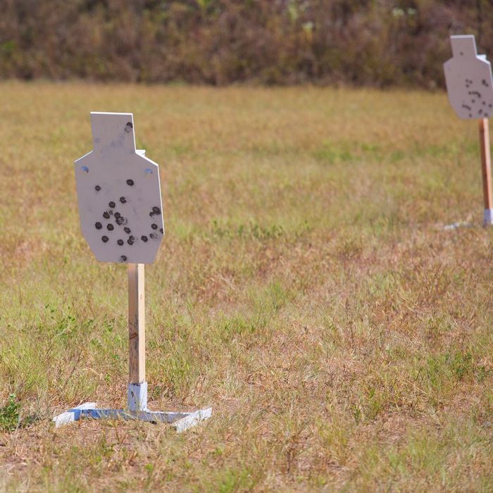 steel IDPA/IPSC style targets with bullet holes