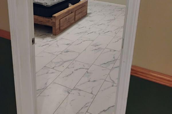 new tile floor in bedroom