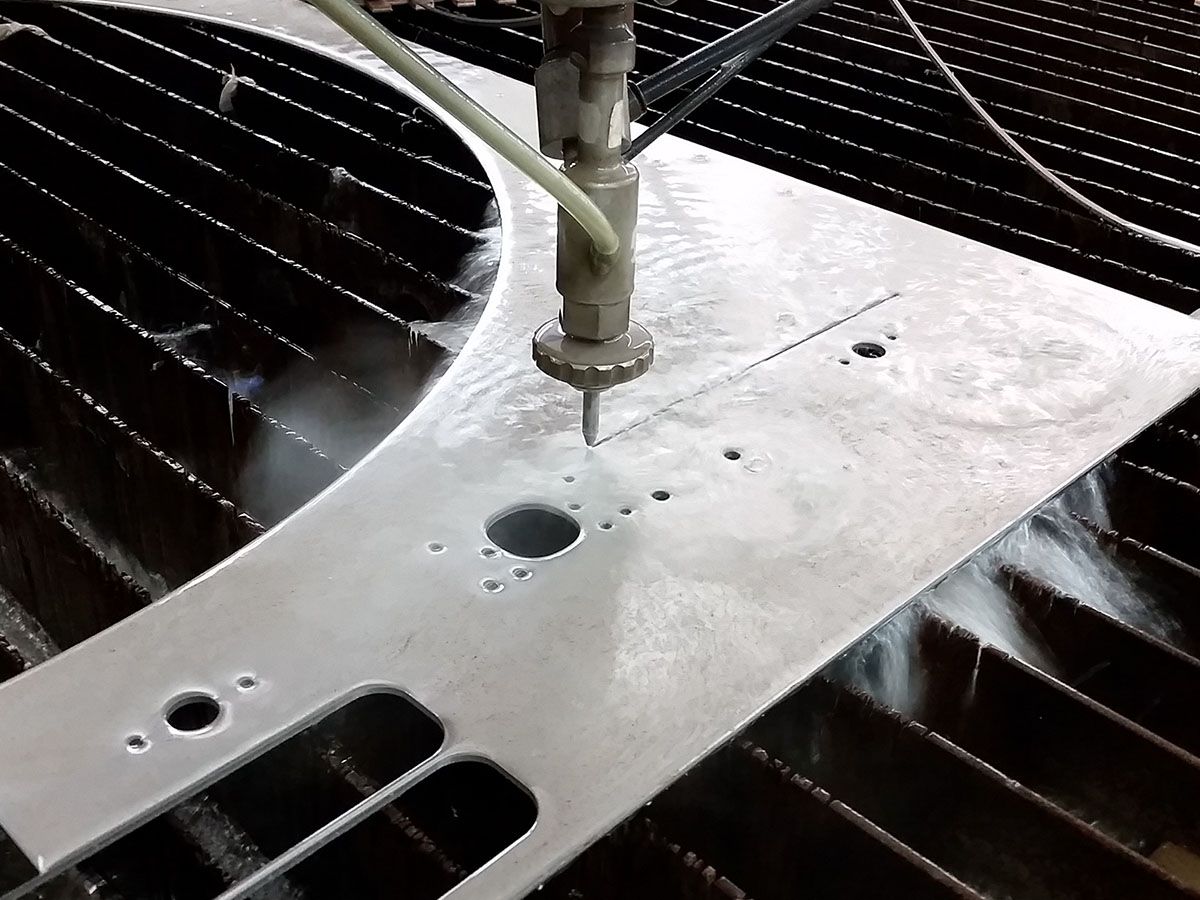 Waterjet machine cutting a line