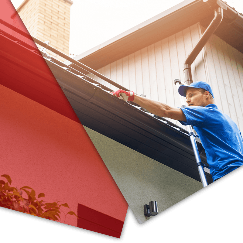 Man cleaning out gutter