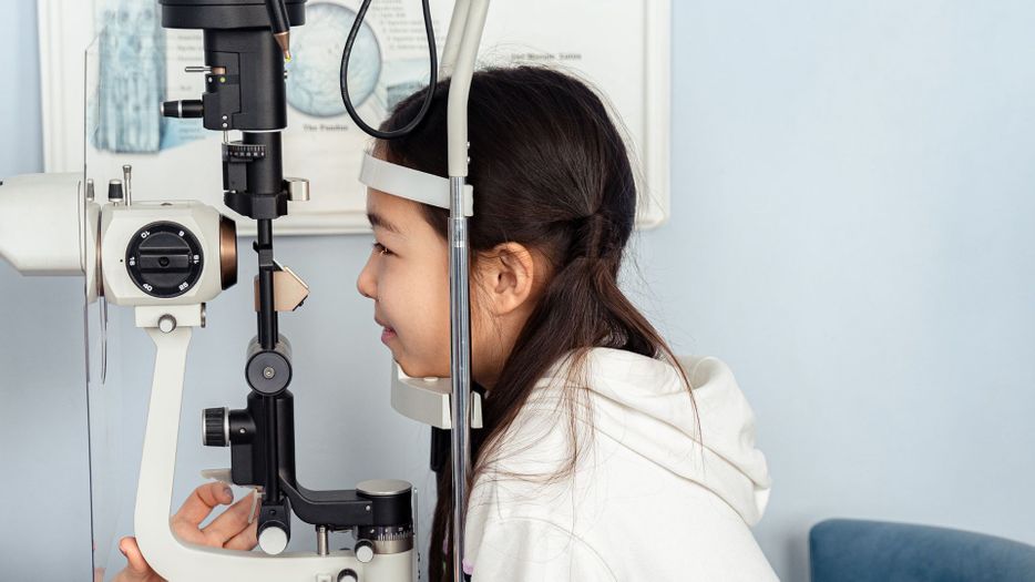 little girl at eye exam