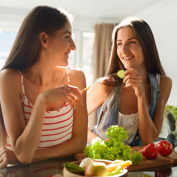 smiling friends eating vegetables smiling friends eating vegetables
