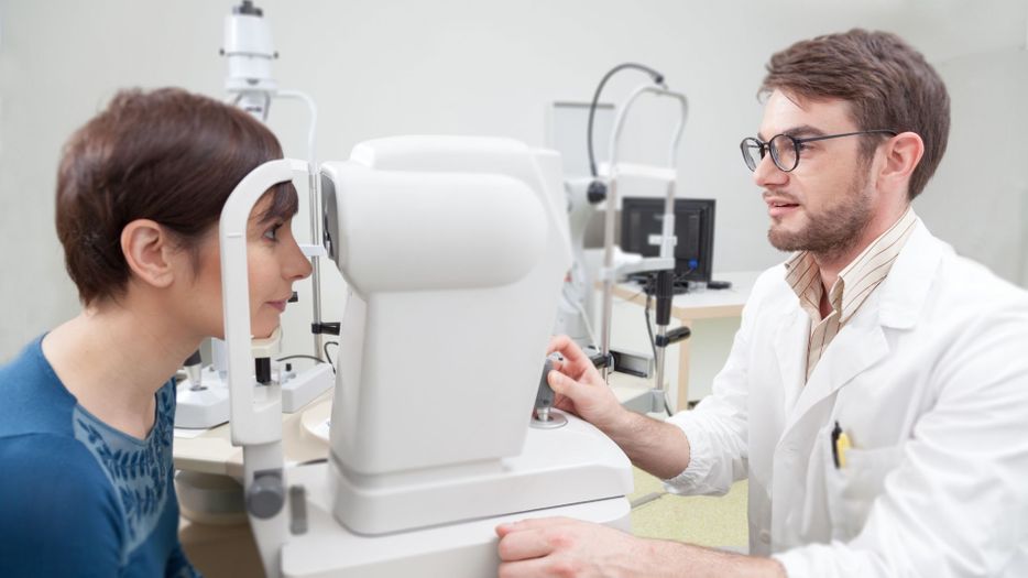 woman getting eye exam