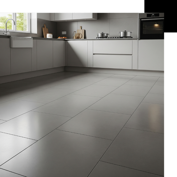 newly installed large format gray tiles in a modern kitchen, highlighting the precise installation and sleek design. newly installed large format gray tiles in a modern kitchen, highlighting the precise installation and sleek design.
