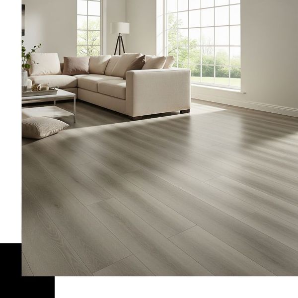 newly installed light gray luxury vinyl plank flooring, featuring a cream sectional sofa and a large window. newly installed light gray luxury vinyl plank flooring, featuring a cream sectional sofa and a large window.