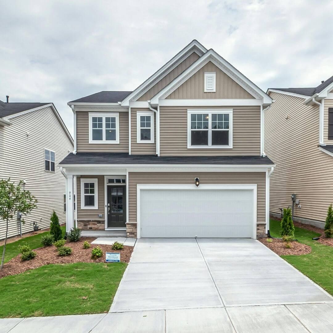house with new tan siding