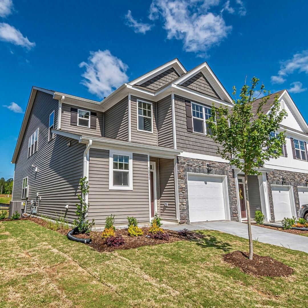 house with tan siding
