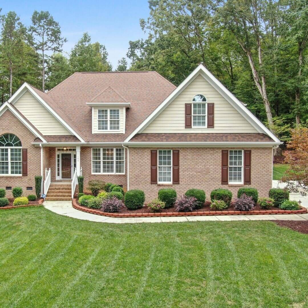 house with brick and vinyl siding