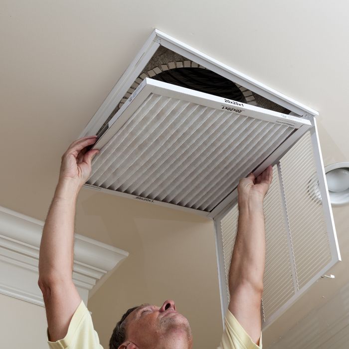 Man changing air filters