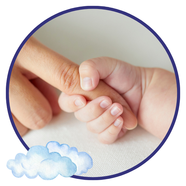 Infant hand holding an adult finger