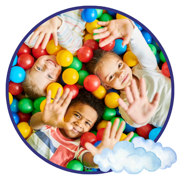 Three children in a ball pit