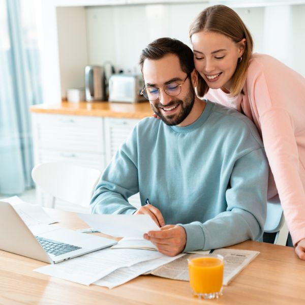 couple smiling at rental income