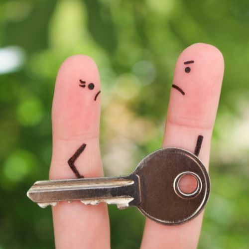 Graphic of two people fighting over a house key