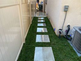 Finished walkway with cement pavers and grass - Bonilla's Landscapes
