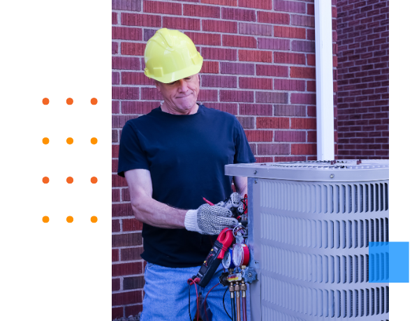 hvac technician working on unit