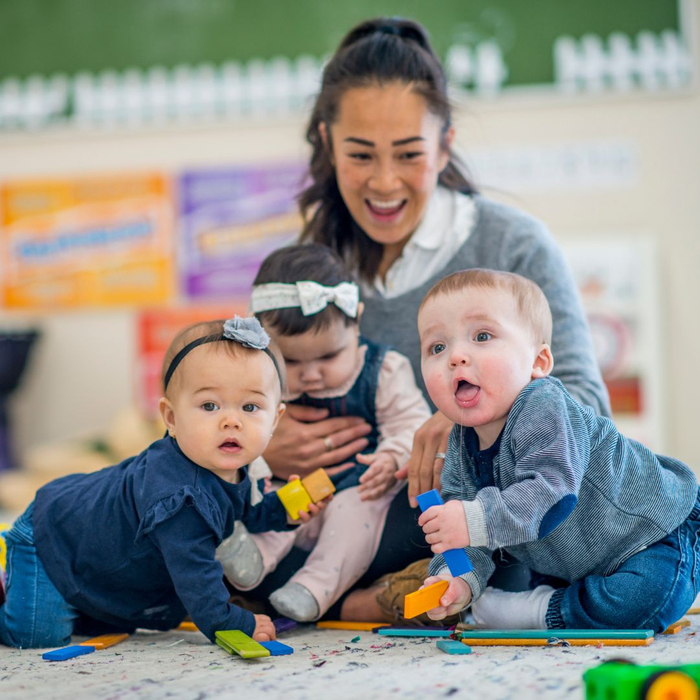 infants smiling at daycare