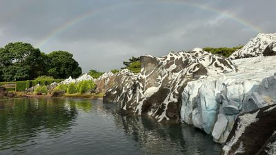 a pool with natural stone Why Professional Pool Maintenance is Crucial for Saltwater Systems Hero.jpg