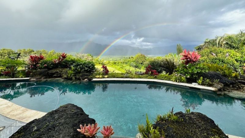 pool with a rainbow in background
