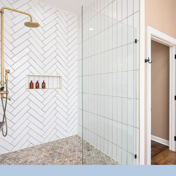 remodeled bathroom with white tile