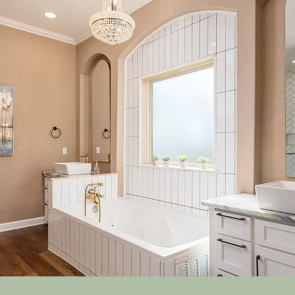 remodeled bathroom with white tile