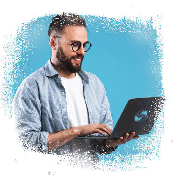 a man reading the talus pay blog on his laptop