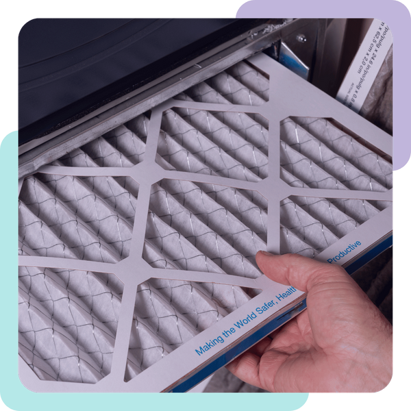 person pulls out furnace filter Santa Cruz 1.png