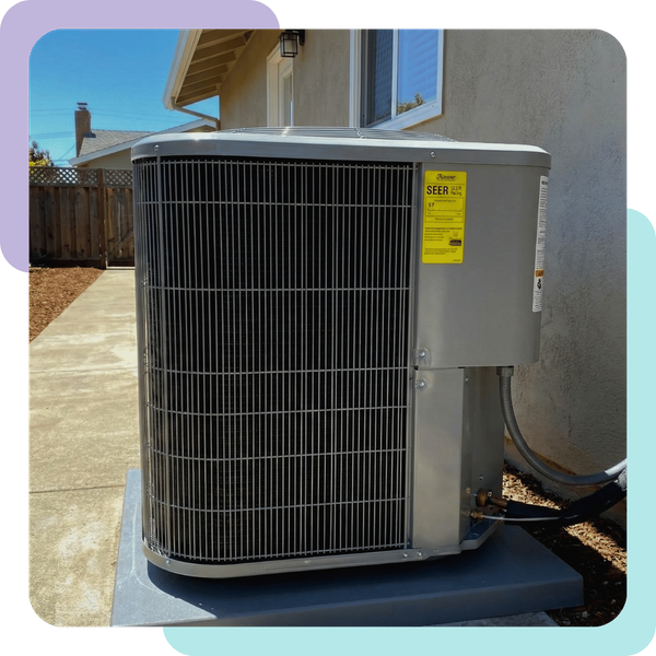 A new, high-efficiency residential air conditioner condenser unit installed at a San Jose home.