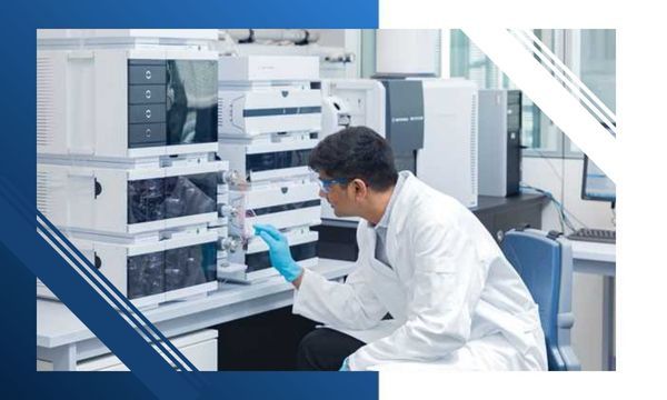 Scientist examining equipment in a laboratory setting