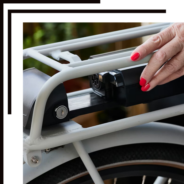 electronic bike battery being plugged in
