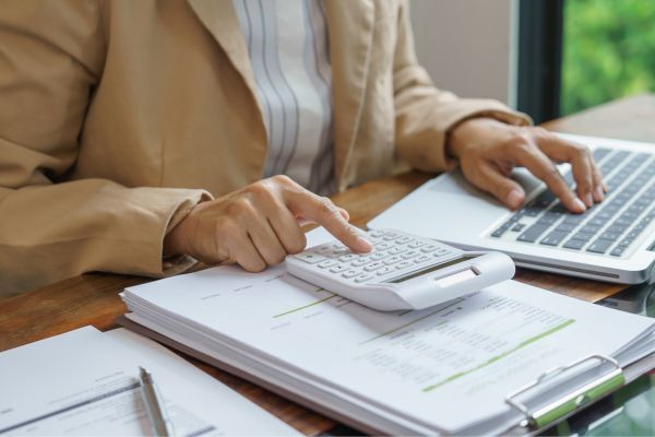 person using calculator